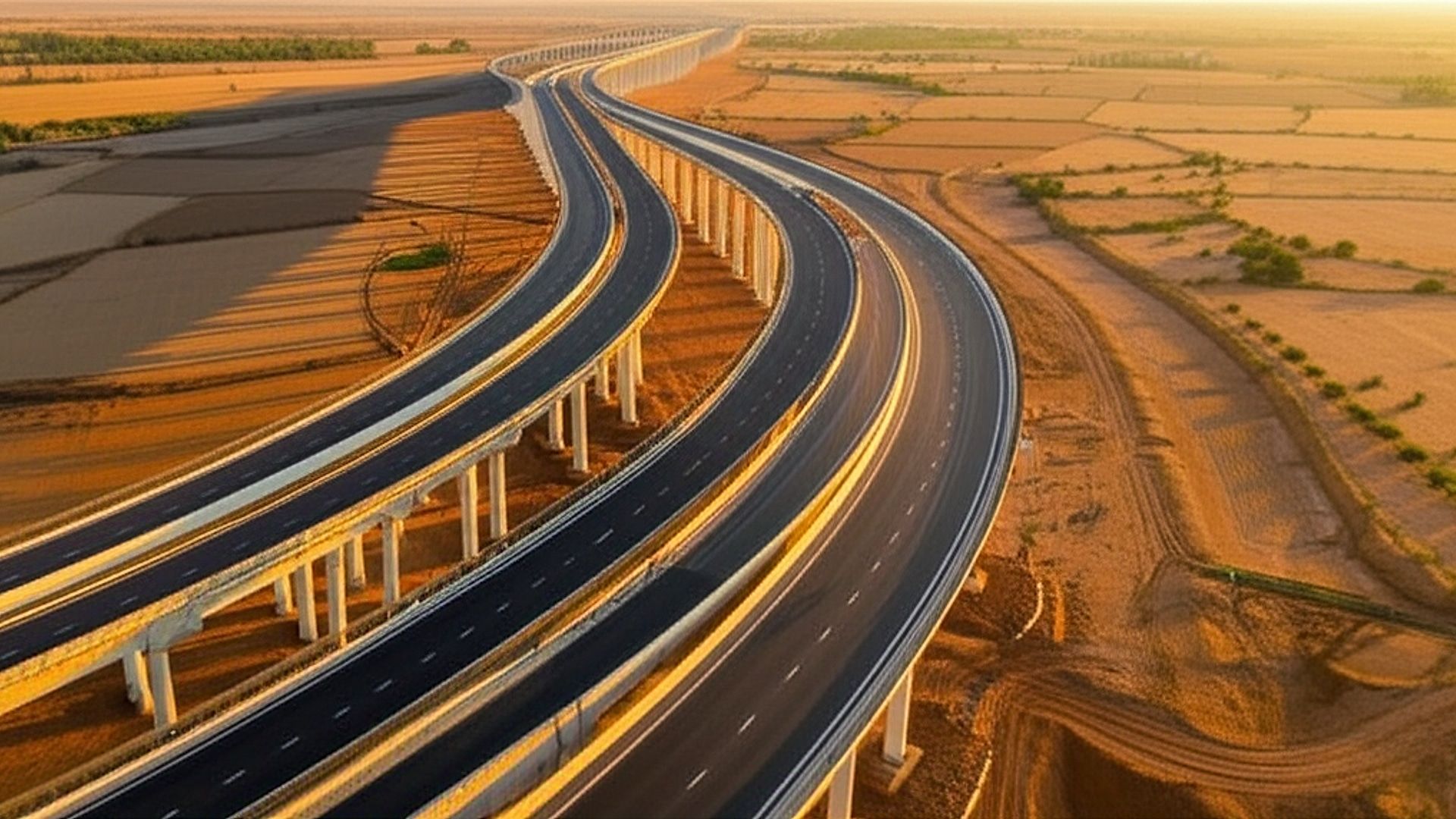 Architectural photograph showcasing a completed section of the NH-168G expressway in Gujarat, India. Focus on a sweeping curve of the elevated highway, highlighting its modern design and concrete structure. The scene should be bathed in the warm, golden light of late afternoon, with long shadows stretching across the arid landscape. Capture the image from a slightly elevated perspective, emphasizing the scale of the project and its integration into the surrounding rural environment. Professional, high-resolution photography with a focus on sharp details and realistic color rendition.. Professional architectural photography, ultra-high quality, sharp focus, vivid colors, dramatic lighting, golden hour, cinematic composition, 8K UHD, photorealistic.